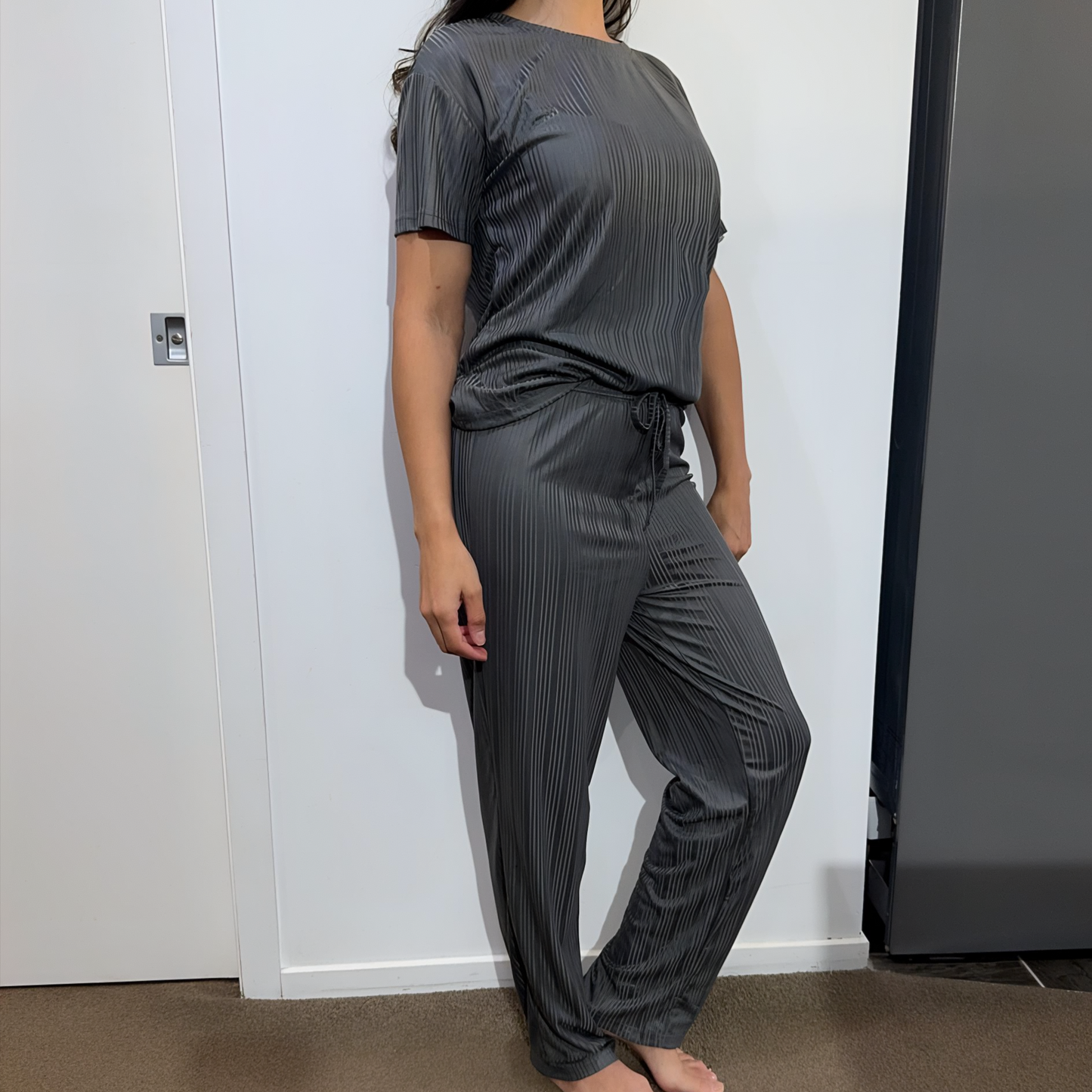 Front view of model wearing the Serene Night sleepwear set – comfortable fit in a sleek dark grey tone.