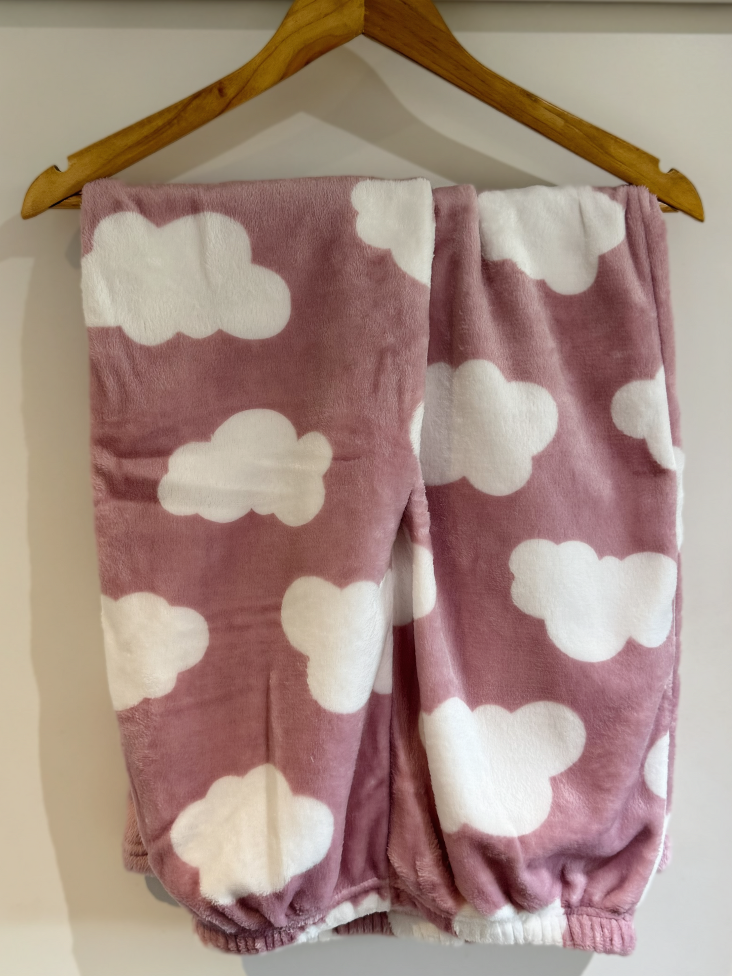 Close-up of embroidered cloud and fabric texture of the Touch of Heaven pajama top.